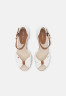 Tommy Hilfiger ICONIC ELBA Platform sandals ecru ICONIC ELBA Сандалии на платформе экрю
