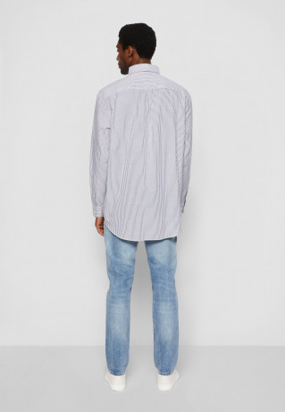 Tommy Hilfiger TOMMY HILFIGER X SHAWN MENDES ITHACA STP ARCHIVE SHIRT UNISEX Shirt blue coast/optic white TOMMY HILFIGER X SHAWN MENDES ITHACA STP ARCHIVE РУБАШКА УНИСЕКС Рубашка синий берег/оптический белый