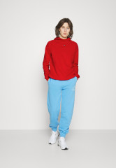 Tommy Hilfiger ESSENTIALS REGULAR HOODIE Sweatshirt primary red ESSENTIALS REGULAR HOODIE Толстовка первичный красный