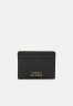 Tommy Hilfiger CASUAL CHIC HOLDER Wallet black CASUAL CHIC HOLDER Бумажник черный