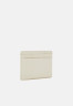 Tommy Hilfiger CASUAL CHIC HOLDER Wallet sugarcane CASUAL CHIC HOLDER Бумажник сахарный тростник