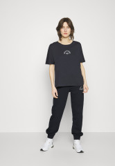 Tommy Hilfiger RELAXED GRAPHIC PANT Tracksuit bottoms desert sky RELAXED GRAPHIC PANT Спортивные штаны небо пустыни