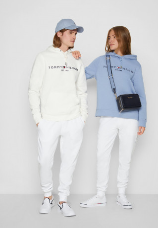 Tommy Hilfiger ROUNDALL GRAPHIC SWEATPANT UNISEX Tracksuit bottoms white СПОРТИВНЫЕ БРЮКИ ROUNDALL GRAPHIC UNISEX Спортивные штаны белый