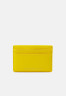 Tommy Hilfiger CONTEMPORARY HOLDER Wallet vivid yellow СОВРЕМЕННЫЙ ДЕРЖАТЕЛЬ Бумажник ярко-желтый