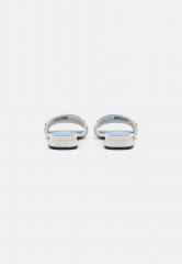 Tommy Hilfiger CHAIN FEMININE FLAT  Mules ecru CHAIN ????FEMININE FLAT Мюли экрю