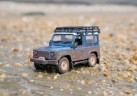 TOMY Muddy Land Rover Defender (1:32) Грязный Land Rover Defender (1:32)