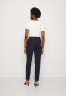 Tommy Hilfiger SLIM PANT Trousers desert sky SLIM PANT Брюки небо пустыни