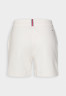 Tommy Hilfiger 1985 MINI CORP LOGO Tracksuit bottoms Weathered White 1985 MINI CORP LOGO Спортивные штаны Выветрившийся белый