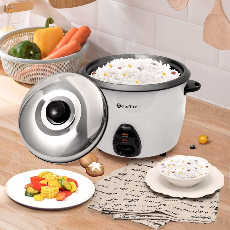 Scheffler Scheffler Reiskocher 1.5L-4.2L, 800-1600 W, Warmhaltefunktion, Antihaftbeschichtet, inkl. Reisloffel + Messbecher, Deckel aus Edelstahl  Рисоварка Scheffler 1,5–4,2 л, 800–1600 Вт, функция поддержания тепла, антипригарное покрытие, в комплекте л