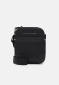 Tommy Hilfiger ELEVATED MINI UNISEX REPORTER Across body bag black ELEVATED MINI UNISEX REPORTER Сумка через плечо черный