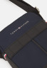 Tommy Hilfiger ELEVATED MINI UNISEX REPORTER Across body bag Space Blue ELEVATED MINI UNISEX REPORTER Сумка через плечо КосмосСиний
