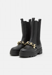 Tommy Hilfiger MONOCHROMATIC CHELSEA BOOT CHAIN Platform boots black MONOCHROMATIC CHELSEA BOOT CHAIN - Ботинки на платформе черный