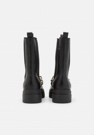 Tommy Hilfiger MONOCHROMATIC CHELSEA BOOT CHAIN Platform boots black MONOCHROMATIC CHELSEA BOOT CHAIN - Ботинки на платформе черный