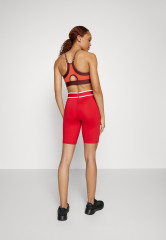 Tommy Hilfiger FITTED TAPE SHORT Leggings primary red КОРОТКИЕ ОБЛЕГАЮЩИЕ ЛЕНТЫ Леггинсы первичный красный