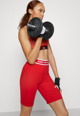 Tommy Hilfiger FITTED TAPE SHORT Leggings primary red КОРОТКИЕ ОБЛЕГАЮЩИЕ ЛЕНТЫ Леггинсы первичный красный