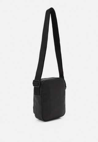 Tommy Hilfiger ESSENTIAL MINI REPORTER UNISEX Across body bag black ESSENTIAL MINI REPORTER UNISEX Сумка через плечо черный