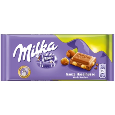 Milka Ganze Haselnusse Альпийский молочный шоколад с лесным орехом  100г