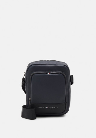Tommy Hilfiger ESSENTIAL MINI REPORTER UNISEX Across body bag space blue ESSENTIAL MINI REPORTER UNISEX Сумка через плечо космический синий