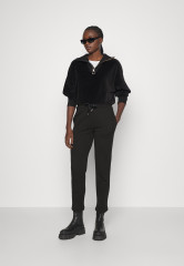 Tommy Hilfiger TAPERED TERRY TRIM Tracksuit bottoms black TAPERED TERRY TRIM Спортивные брюки черный