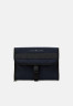 Tommy Hilfiger ELEVATED WASHBAG UNISEX Wash bag space blue ELEVATED UNISEX WASHBAG Сумка для стирки космический синий