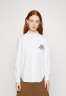 Tommy Hilfiger VINTAGE VARSITY Button-down blouse optic white VINTAGE VARSITY Блуза на пуговицах оптический белый