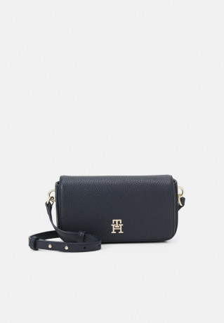 Tommy Hilfiger EMBLEM FLAP CROSSOVER Across body bag space blue EMBLEM FLAP CROSSOVER Сумка через плечо космический синий