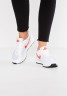 Nike Sportswear OUTBURST Sneaker low white/team orange/black OUTBURST Низкие кроссовки женские белый/оранжевый/черный