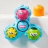 TOMY Badespielzeug Dreh- und Spritz Oktopus Игрушка для ванны крутит и сквиртует осьминога