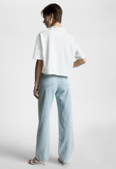 Tommy Hilfiger MODERN RELAXED HALF SLEEVE Polo shirt ecru MODERN RELAXED HALF SLEEVE Рубашка поло экрю