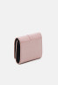 Tommy Hilfiger PLUSH FLAP WALLET Wallet soothing pink КОШЕЛЕК С ПЛЮШЕВЫМ КЛАПАНОМ Бумажник успокаивающий розовый