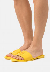 Tommy Hilfiger POP MULE Mules vivid yellow POP MULE Мюли ярко-желтый
