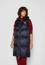 Tommy Hilfiger MONOGRAM BADGE VEST Waistcoat desert sky ЖИЛЕТ С МОНОГРАММОЙ Жилет небо пустыни