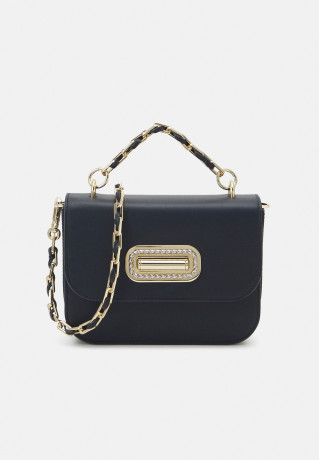Tommy Hilfiger HERO TURNLOCK MINI CROSSOVER Across body bag space blue HERO TURNLOCK MINI CROSSOVER Сумка через плечо космический синий