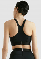 Tommy Hilfiger ESSENTIAL RACERBACK Medium support sports bra black ESSENTIAL RACERBACK Спортивный бюстгальтер со средней поддержкой черный