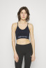 Tommy Hilfiger ESSENTIALS LOW SEAMLESS BRA Light support sports bra desert sky ESSENTIALS LOW SEAMLESS BRA Спортивный бюстгальтер с легкой поддержкой небо пустыни