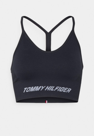 Tommy Hilfiger ESSENTIALS LOW SEAMLESS BRA Light support sports bra desert sky ESSENTIALS LOW SEAMLESS BRA Спортивный бюстгальтер с легкой поддержкой небо пустыни