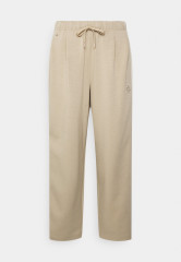 Tommy Hilfiger RELAXED INTERLOCKPANT Tracksuit bottoms beige RELAXED INTERLOCKPANT Спортивные штаны бежевый