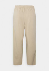 Tommy Hilfiger RELAXED INTERLOCKPANT Tracksuit bottoms beige RELAXED INTERLOCKPANT Спортивные штаны бежевый
