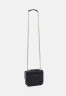 Tommy Hilfiger MINI TURNLOCK Across body bag space blue MINI TURNLOCK Сумка через плечо космический синий