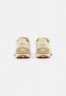 Nike Sportswear W WAFFLE ONE ESS Sneaker low coconut milk/sanddrift/lemon drop/summit white/white W WAFFLE ONE ESS кроссовки женские низкие кокосовое молоко/песок/лимонная капля/саммит белый/белый