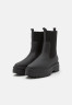 Tommy Hilfiger FEMININE SEASONAL UTILITY Platform ankle boots black FEMININE SEASONAL UTILITY Ботильоны на платформе черный