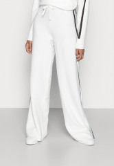 Tommy Hilfiger FLEX WIDE LEG PANT Tracksuit bottoms ecru FLEX WIDE LEG PANT Брюки от спортивного костюма экрю