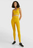 Tommy Hilfiger MID INTENSITY SHINY SEAMLESS  Sports bra countryside yellow MID INTENSITY SHINY SEAMLESS Спортивный бюстгальтер сельский желтый