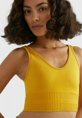 Tommy Hilfiger MID INTENSITY SHINY SEAMLESS  Sports bra countryside yellow MID INTENSITY SHINY SEAMLESS Спортивный бюстгальтер сельский желтый