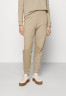 Tommy Hilfiger REGULAR SCRIPT  Tracksuit bottoms beige ОБЫЧНЫЙ СЦЕНАРИЙ Низ спортивного костюма бежевый