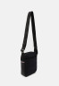 Tommy Hilfiger Across body bag space blue Сумка через плечо космический синий