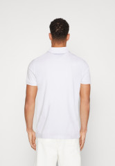 Tommy Hilfiger SHADOW UNISEX Polo shirt optic white SHADOW UNISEX Рубашка поло оптический белый