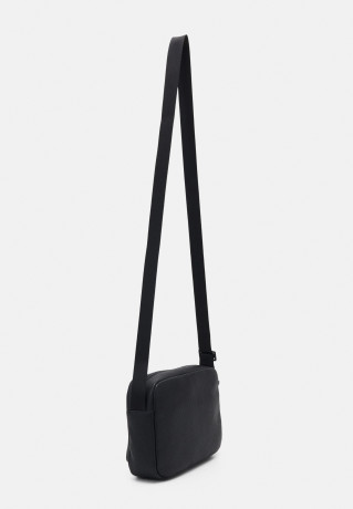 Tommy Hilfiger CENTRAL MESSENGER UNISEX Across body bag black CENTRAL MESSENGER UNISEX Сумка через плечо черный