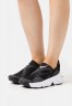Nike Sportswear GO FLYEASE Sneaker low black/white GO FLYEASE Низкие кроссовки женские черно-белый