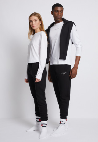 Tommy Hilfiger LOGO SWEATPANTS UNISEX Tracksuit bottoms black СПОРТИВНЫЕ БРЮКИ С ЛОГОТИПОМ УНИСЕКС Спортивные штаны черный